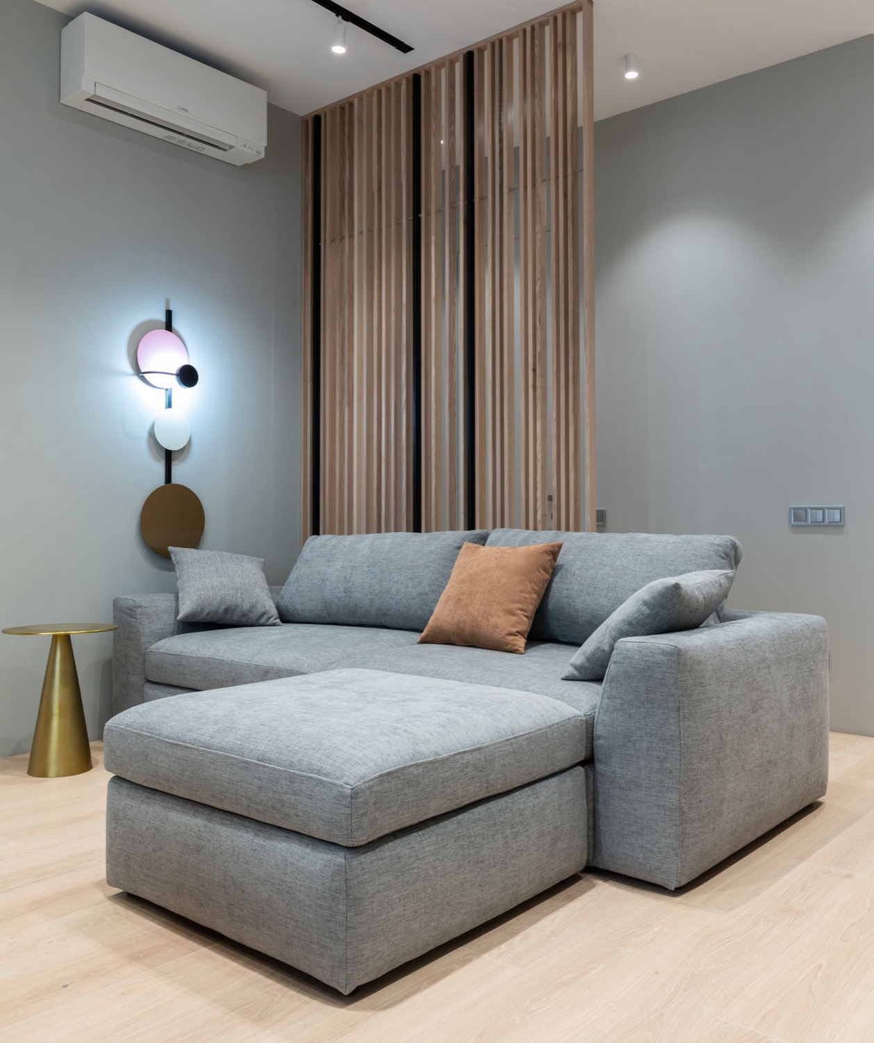 Gray sectional sofa with chaise in a living room